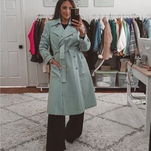 Double blue breasted trench coat.